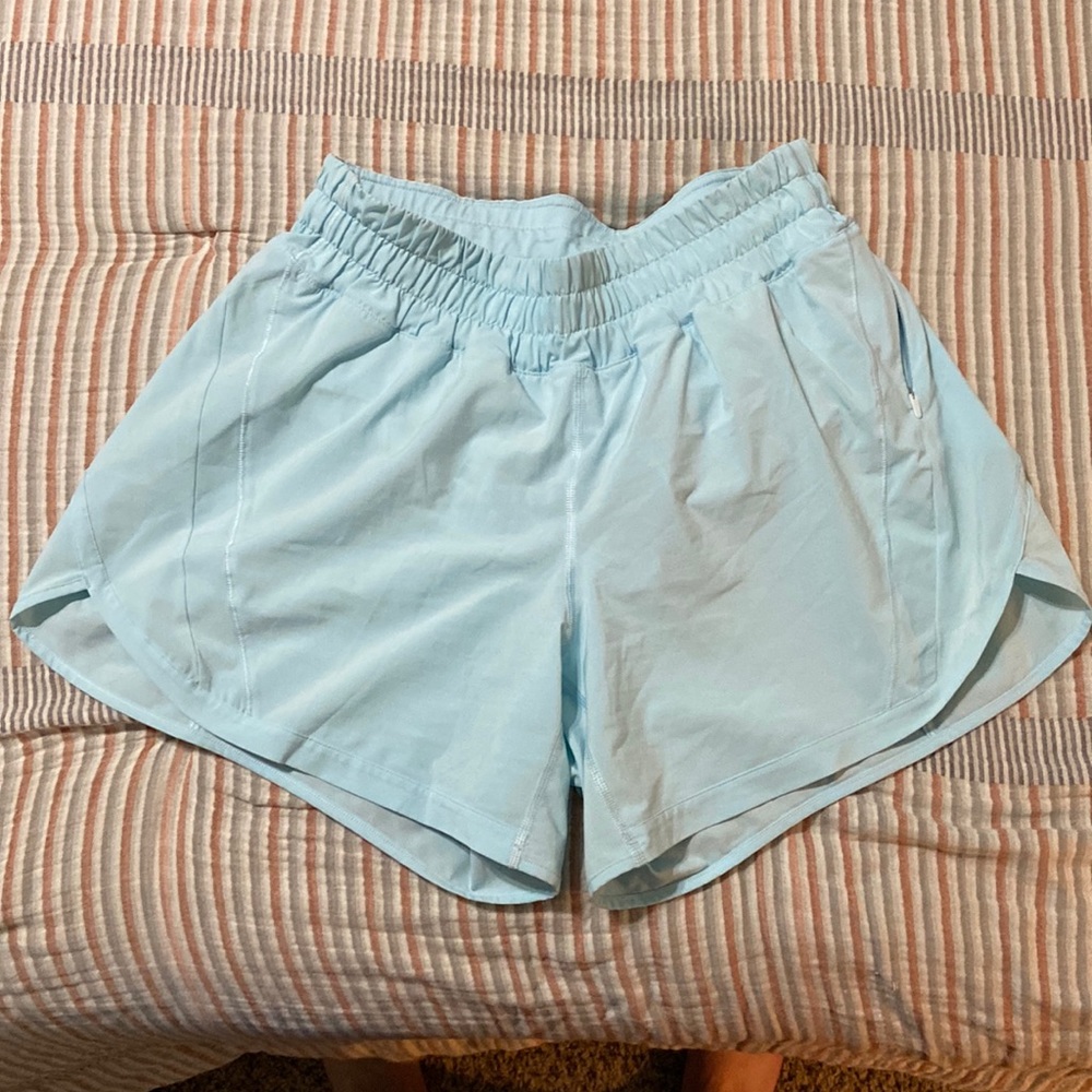 Like new Lululemon TRACK THAT SHORT 5" blue glow size 8
